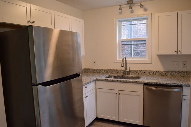 Building Photo - Charming Northside Two-Story Brick Home With 2 car garage and basement