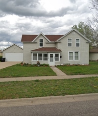 Building Photo - AVAILABLE NOW! Large 3 Bedroom, 2 Bathroom, with Extra Rooms and Two Car Garage in Anoka