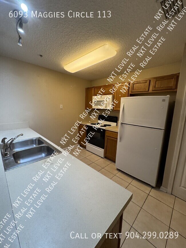 Building Photo - 6093 Maggies Cir