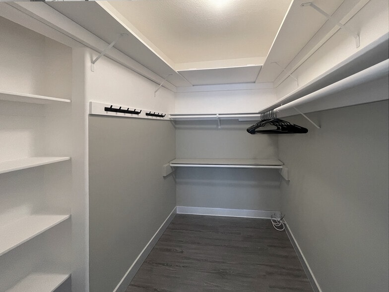 HUGE Master closet with several tiers of shelves - 9047 Langdon Ave
