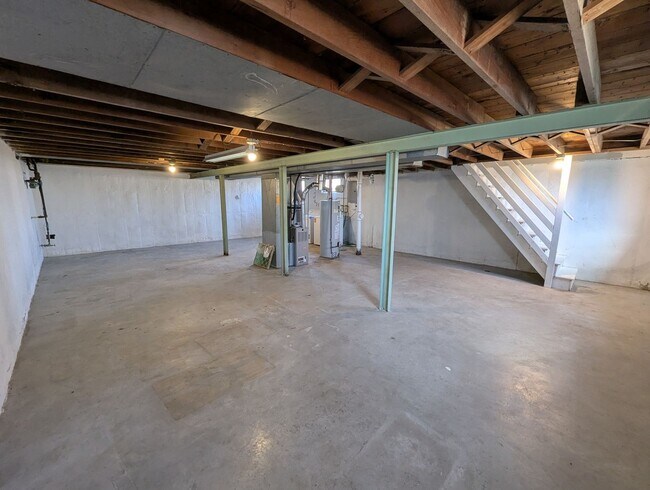 Building Photo - Fully Renovated Home with Sunroom, Garage & Huge Fenced Yard