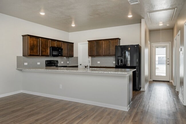 Building Photo - Where Style Meets Comfort: Elevate Your Living Experience