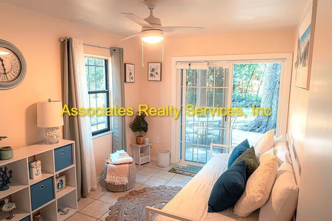 Building Photo - Beautifully furnished  2-Bedroom Duplex – ...