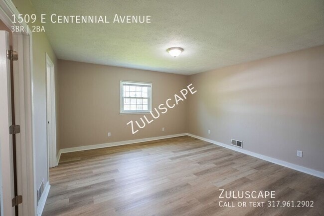 Building Photo - 1509 E Centennial Ave