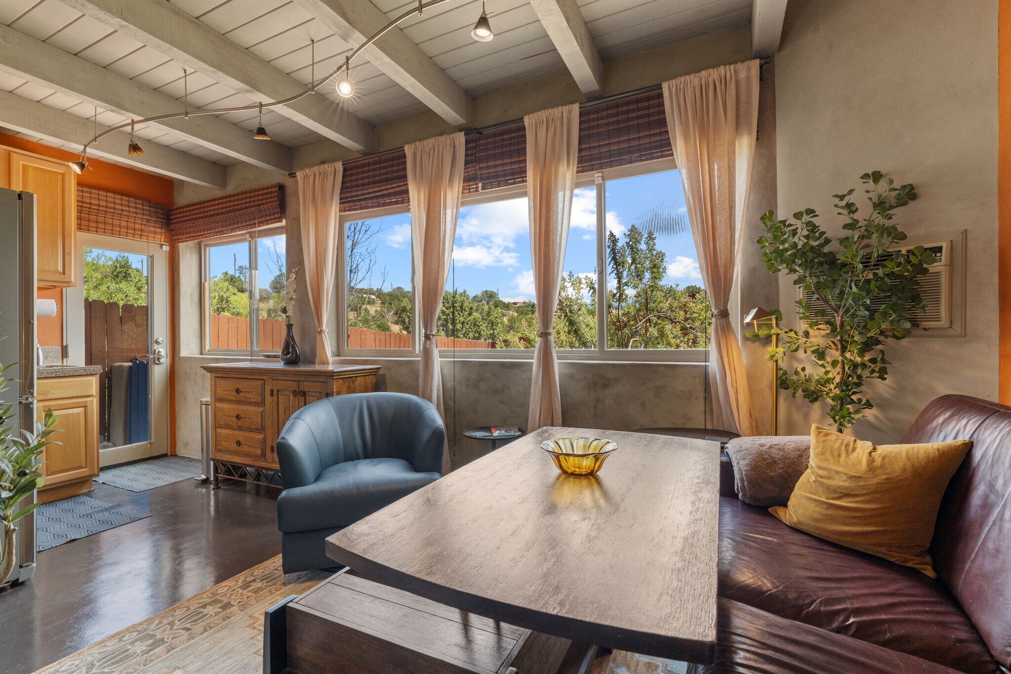 Lift-top coffee table converts table into a desk or dining area. - 2132 Ridgeview Cir