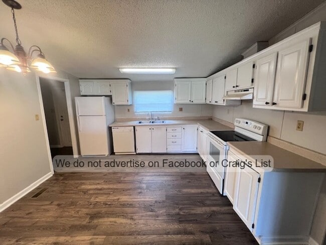 Building Photo - McDougald Downs- Darby Drive