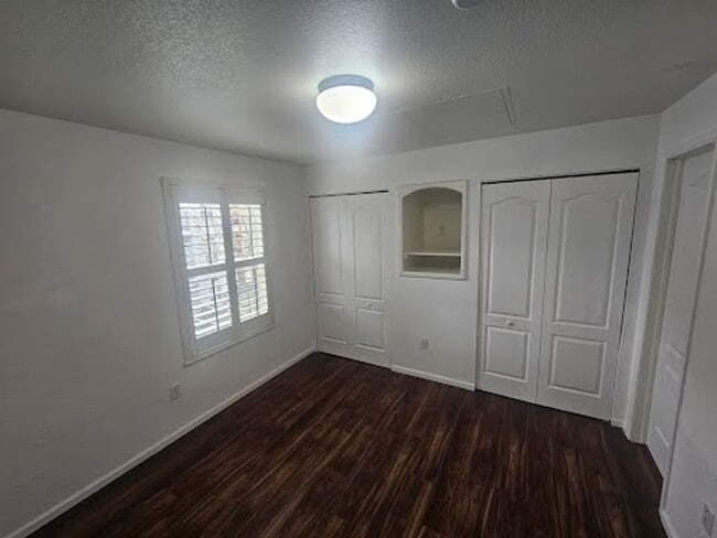 Building Photo - **Coming Soon** 2 Bed/2 Bath Top Floor Condo with Covered Garage Space and Additional Storage