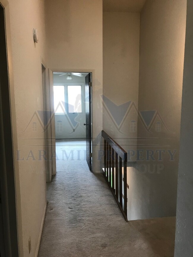 Building Photo - 3-Bedroom Townhome with Fenced Yard & Detached Garage