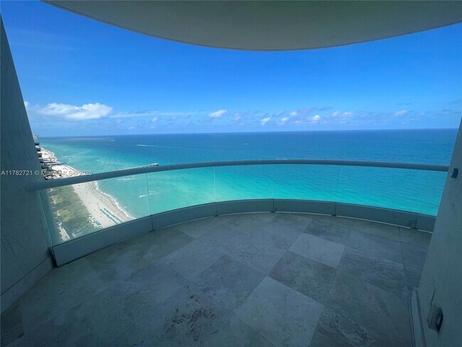 Building Photo - 16047 Collins Ave