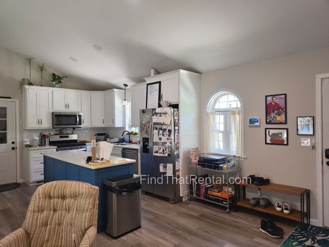 Building Photo - Available August 16! A pet friendly ranch with dishwasher, garage, basement, storage, yard, deck