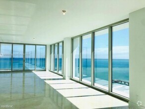 Building Photo - 4 br, 5.5 bath Condo - 16901 Collins Ave A...