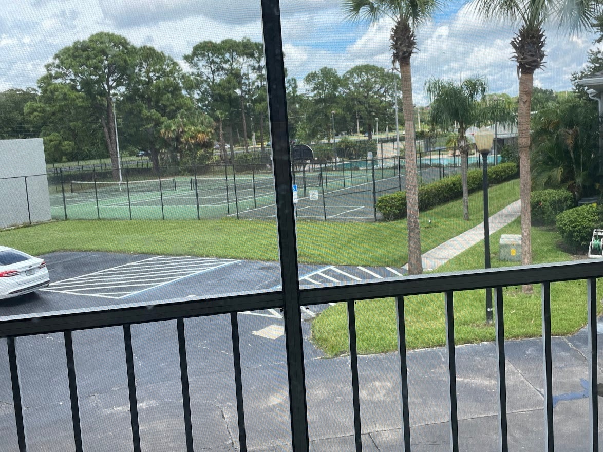 View of Corts and pools from balcony - 4377 White Pine Ave