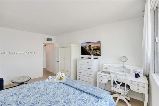 Building Photo - 5005 Collins Ave