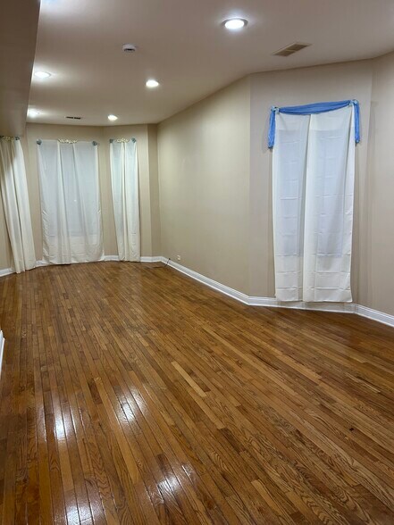 Open Dining/Living room facing east - 6630 S Ingleside Ave