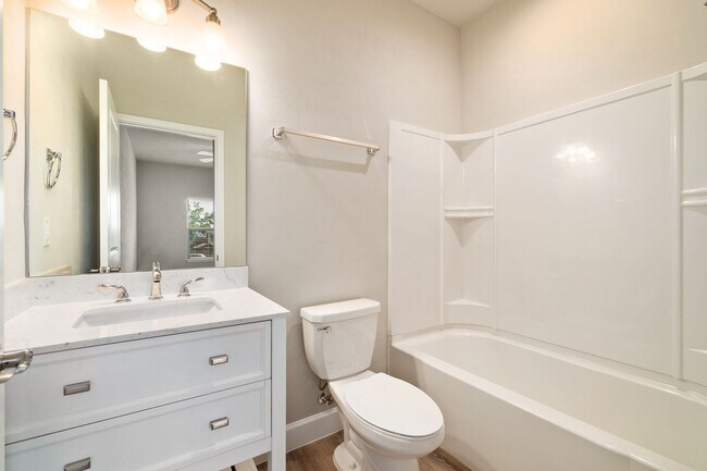 Building Photo - The Reef Townhome NOW LEASING FOR FALL 2026!