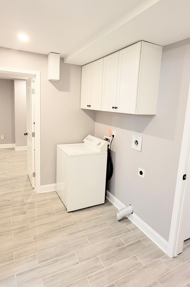 Building Photo - Stylish Basement Rental with Private Ameni...