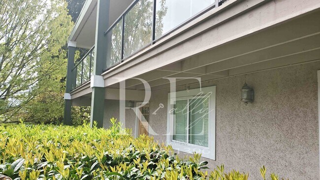 Building Photo - Modern Manette 1BR Condo with Private Pati...