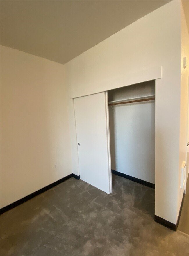 Building Photo - Miley Gardens at Eastmont- 55+ Senior Affordable Community