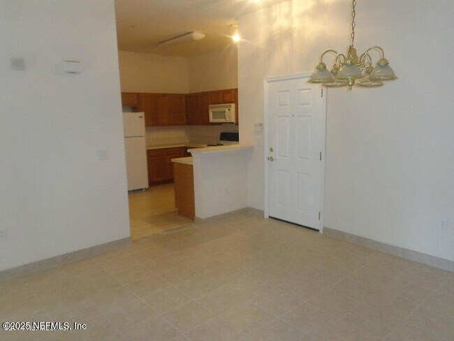 Building Photo - 9595 Amarante Cir