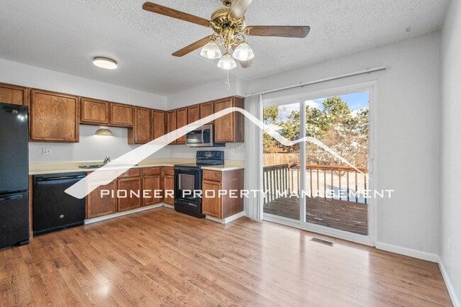 Building Photo - Spacious Split-Level Home in D20 with Mountain Views, 2 Car Garage, Fenced Yard and AC!