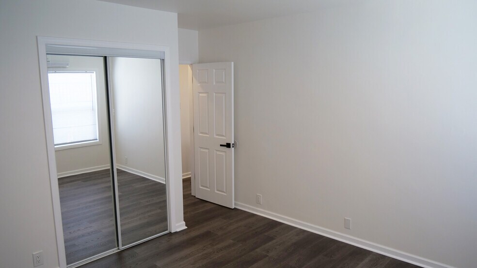 Master bedroom. Mirrored built-in closet. New floors - 259 E Puente St