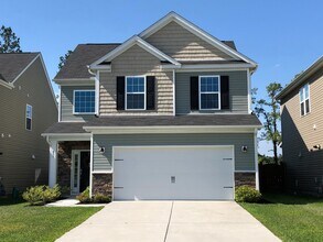 Building Photo - 4 Bedroom 2.5 Bath House in Cane Bay Plantation - Summerville