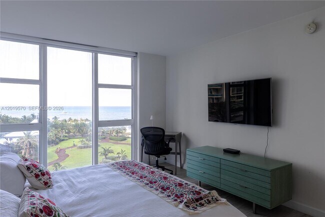 Building Photo - 10275 Collins Ave