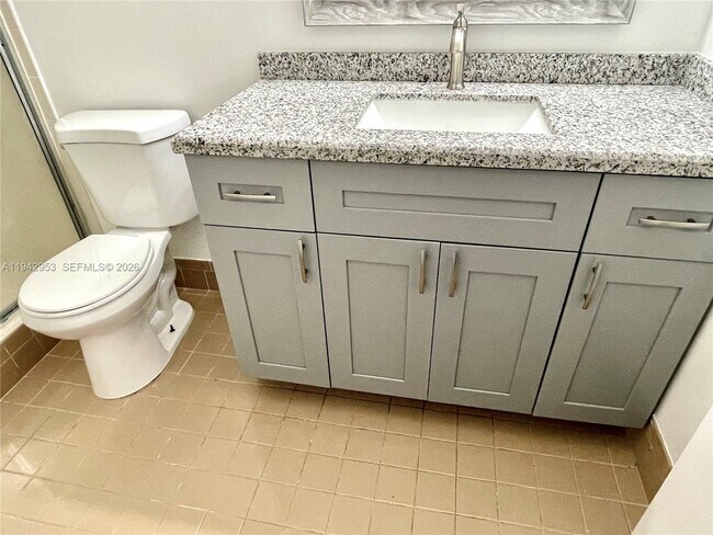 Building Photo - 10992 Royal Palm Blvd