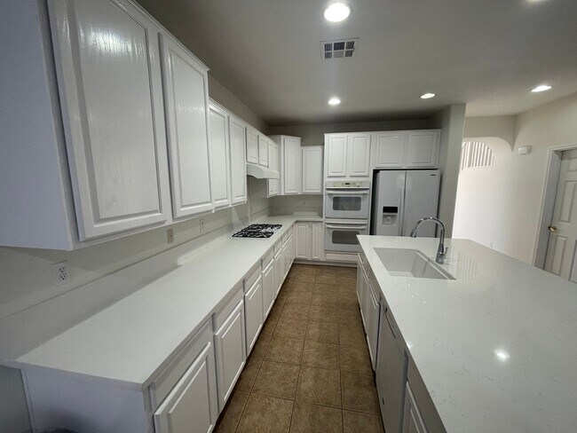 Building Photo - THIS 2 STORY HOME IN A GATED COMMUNITY HAS...