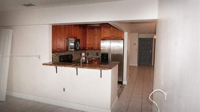 Building Photo - 4909 SW 144th Ct