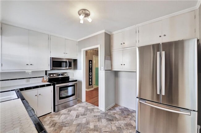 Building Photo - COMING IN JUNE! Location. Character. Charm. This one has it all!