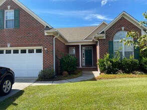 Building Photo - Magnolia Greens - Leland