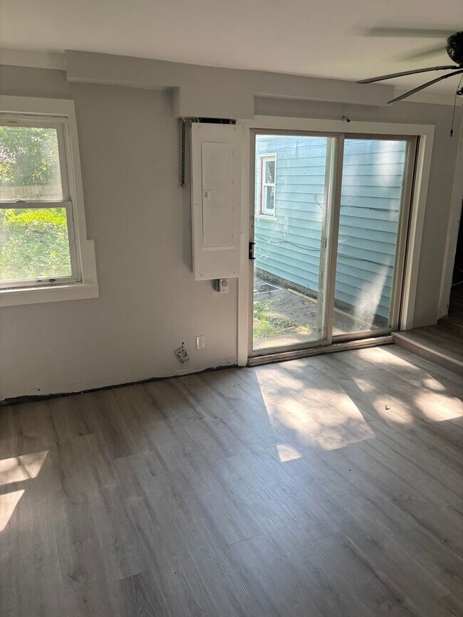 Building Photo - Perfect Home for You and Your Pup! Dog House Included + Fenced Yard