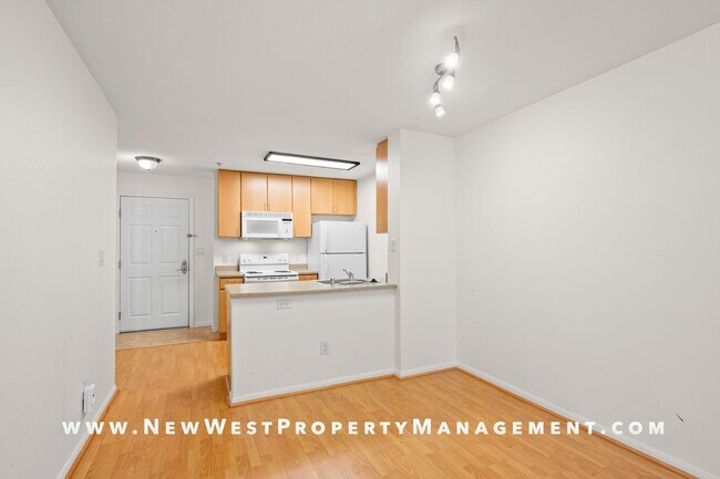 Building Photo - Charming Little Italy 1-Bedroom at Portico! Small Pet OK! Available Now!