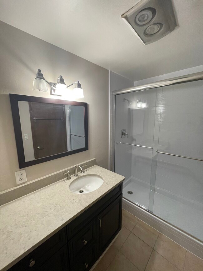 In bathroom with new shower (2024). - 7001 Sand Point Way NE
