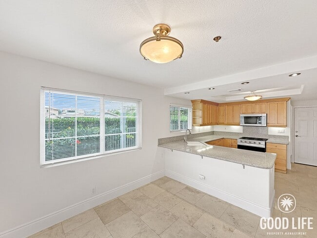Building Photo - Fully Renovated End-Unit 3BD/2.5BA in Lake Forest with Views, Private Yard & 2-Car Garage