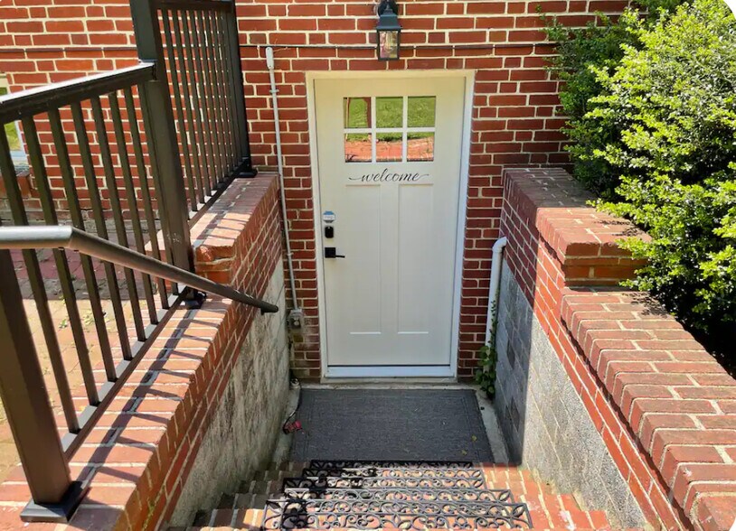 4 steps down to front entry door - 49 Riverside Ave