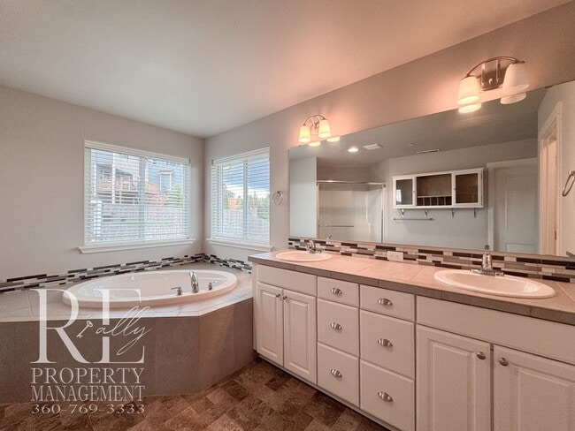 Building Photo - Vaulted Ceilings, Tree-Lined Views & a Spacious Primary Suite Retreat