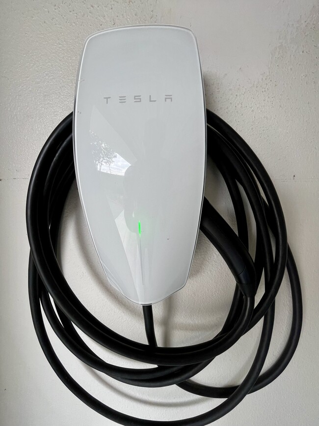 Tesla charger included for tenants use. - 5256 Pacific Ter