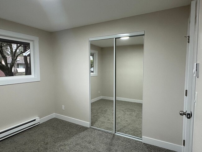 Building Photo - Spacious three-bedroom home available for rent!