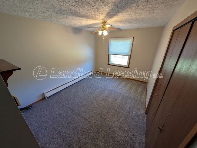 Building Photo - Spacious 4-Bedroom Home with Scenic Views ...
