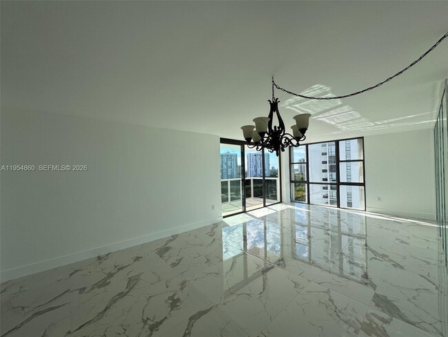 Building Photo - 3675 N Country Club Dr