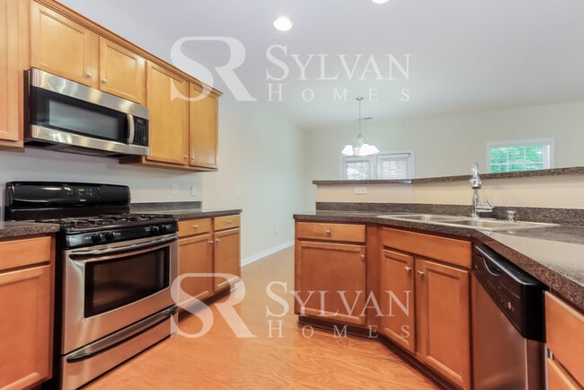 Building Photo - Turn the key. Enter. Smile. Repeat every day!