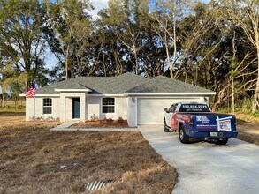 Building Photo - NOT AVAILABLE FOR SHOWING OR MOVE IN UNTIL 09/15/2026!!! Custom Home - Desirable SE Ocala neighbo...