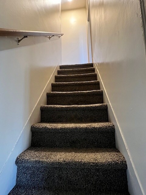 Stairway to 2nd floor - 113 E Franklin St