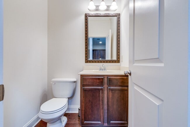Building Photo - Welcome to this charming end unit townhome