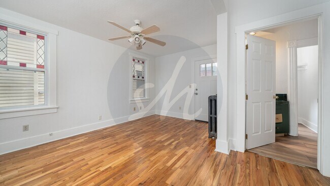 Building Photo - Updated 2-Bed Victorian Main-Floor Living with Stained Glass & Jetted Tub
