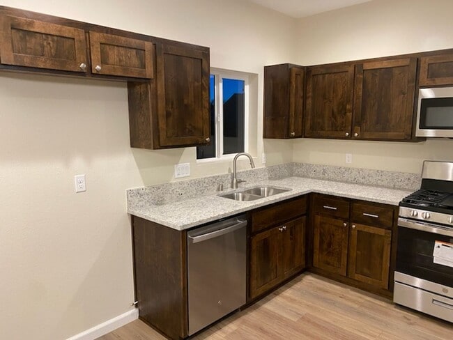 Building Photo - Brand New 4 Bedroom Charming home