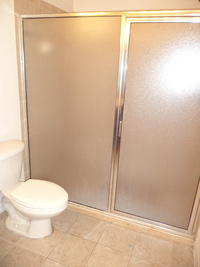 Building Photo - GATED COMMUNITY WITH COMMUNITY POOL