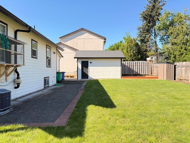 Building Photo - Lovingly Updated Home with Separate Garage, Outdoor Cat Enclosure, Finished Basement, Large Yard,...